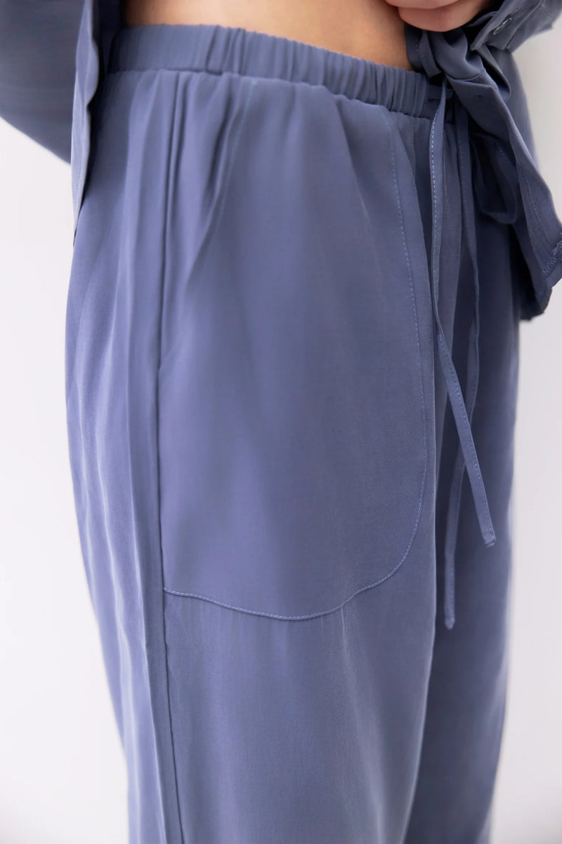 Loose fit, wide leg pant, blue, polyester, rayon. Made by Mod Ref. Close up view