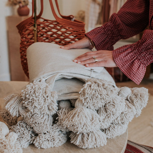 Styled-Home-Decor-Natural-Hand-Woven-Pom-Pom-Blanket-Bon-Ton-Studio